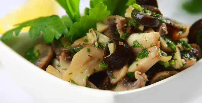 Pieczarki z oliwkami